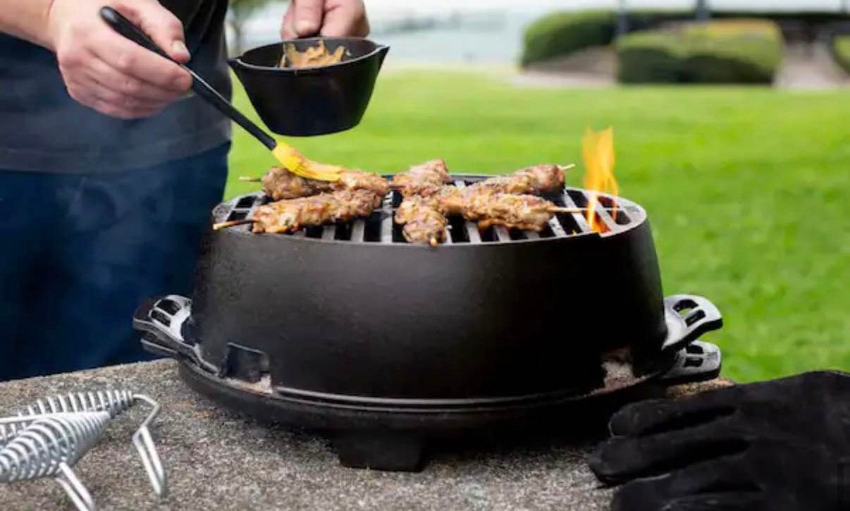0.5 qt. Cast Iron Melting Pot in Black with Silicone Brush