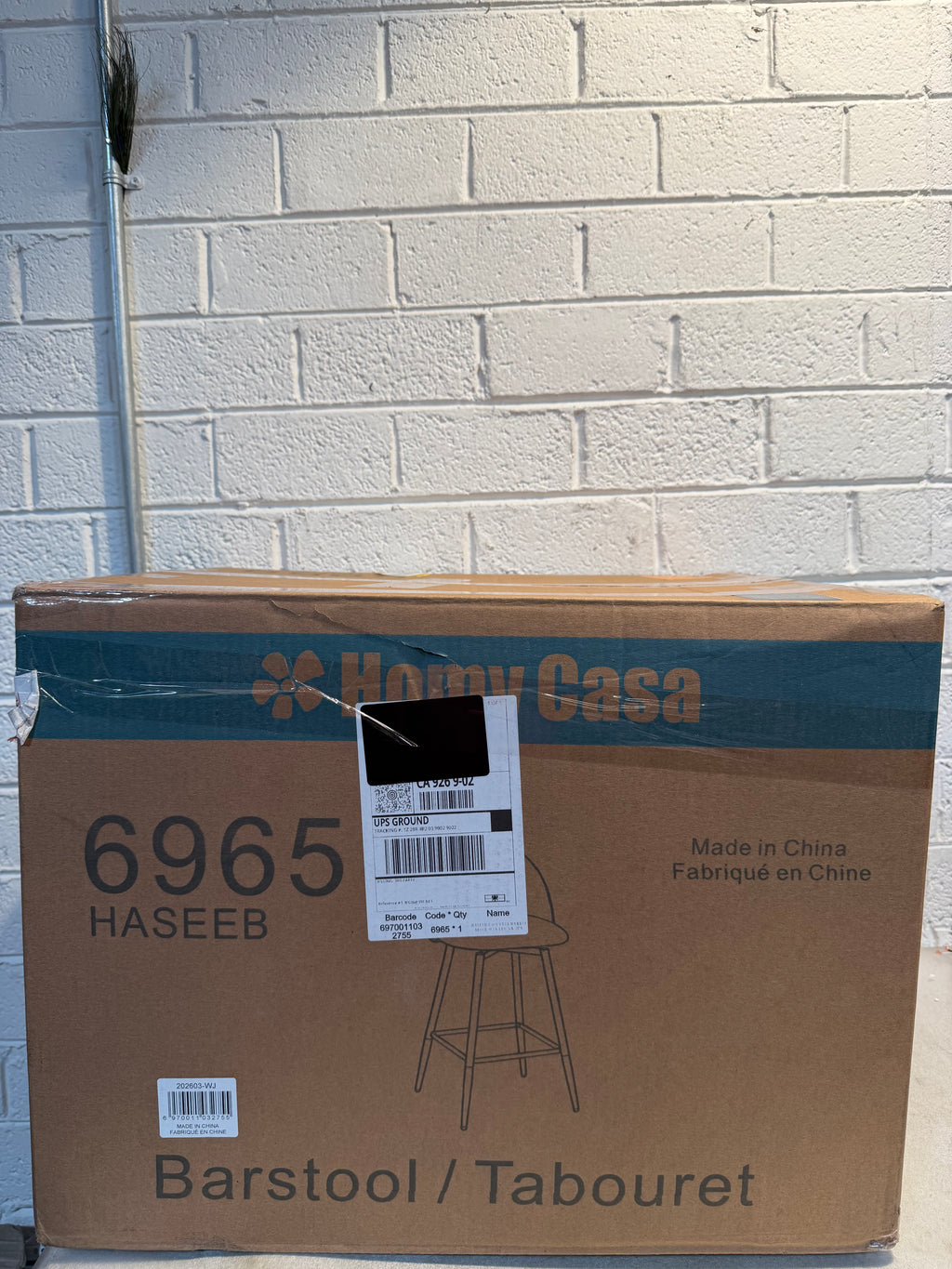 Haseeb Modern Swivel Bar Stool