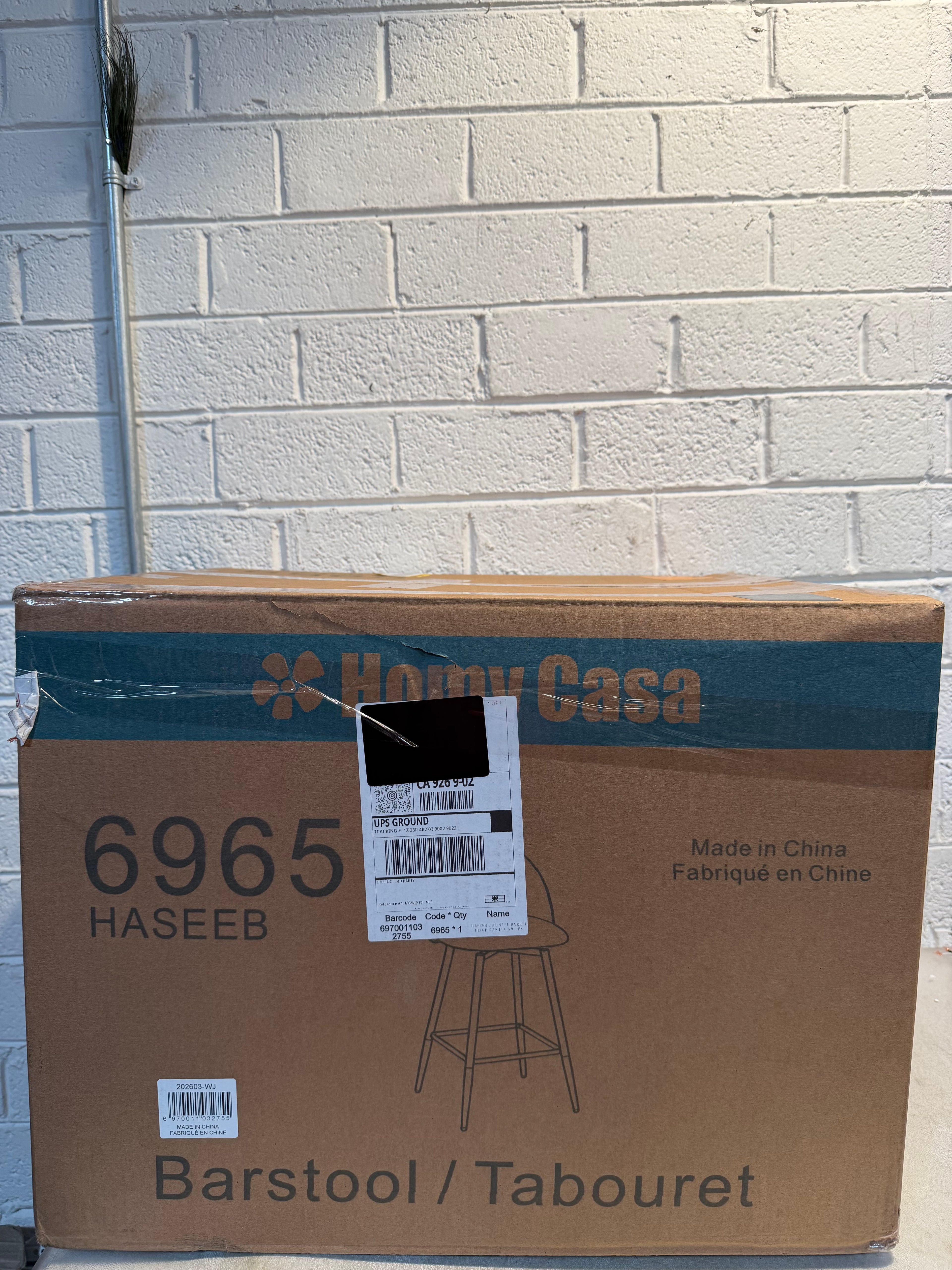 Haseeb Modern Swivel Bar Stool
