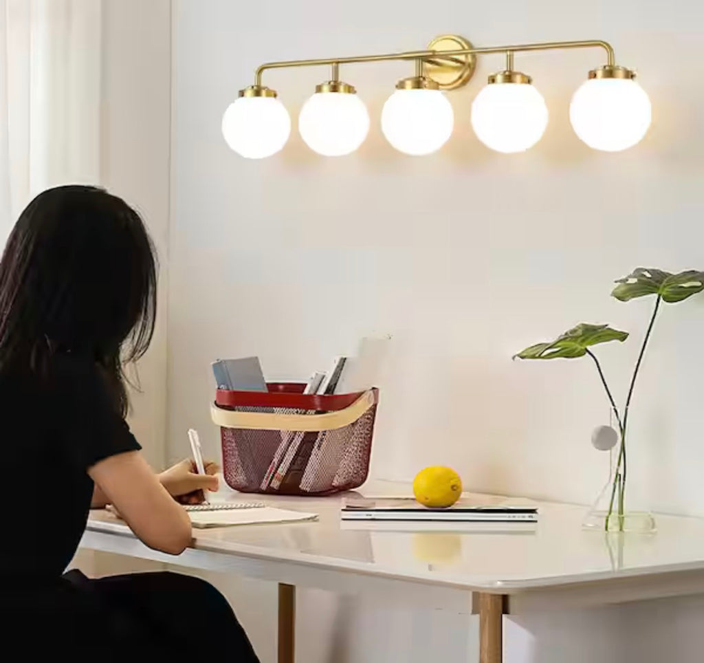 Modern 5-Light Gold Vanity Light with White Glass Globes